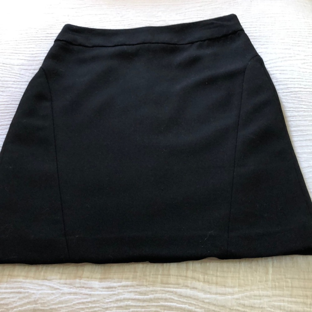 Black  lined skirt fitted high waist.hidden back zipper.